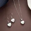 Nuevo traje de colgante de aretes de lazo de acero de titanio transfronterizo estilo callejero europeo y estadounidense de acero inoxidable que no se desvanece joyería para hombres y mujeres