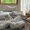 Conjunto de cuatro piezas de algodón tejido floral fresco y delicado, suave y acogedor para dormir sin nada, funda de edredón, sábana, juego de ropa de cama de tres piezas para dormitorio de estudiante