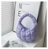 Bolsa para Mujer 2025 Nueva de Nicho Bolsa Nube Coreana Plegada Bolsa de Mano Burbuja Abrigo Acolchado de Algodón Bolso de Mano Dumpling