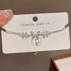 Design de moda de nicho pulseira de laço de diamante cheia de temperamento feminino requintado Coringa super brilhante joias de alta qualidade atacado