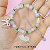 Barraca de ponto cênico vendendo joias feitas à mão com miçangas imitação de jade contas de barril pulseira de vidro atacado masculino e feminino este ano pulseira