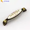Patrón de piedra de pájaro lunar flor de oro grande mango de cerámica estilo europeo pastoral mango manija de gabinete armario clásica