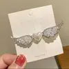 Pinza para el pelo estilo ins de mariposa con circonita para mujer, pinza lateral larga y elegante con borla de pedrería, versión coreana popular de pinza lateral para el pelo