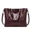 2023 nuevo bolso de moda europeo y americano para mujer bolso tote de cuero encerado de moda bolso de hombro simple para mujer una generación de pelo