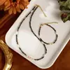 Diseño original pulsera de perla de agua dulce natural ojo de tigre piedra de vesícula negra pulsera brazalete versátil de alta gama al por mayor