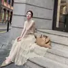 Suéter fino de verano sin mangas de seda helada camiseta nuevo estilo Hong Kong casual estilo occidental ligero maduro elegante top falda