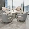 Oficina de ventas moderna de lujo ligero departamento de ventas mesa de negociación 4 sillas mesa redonda pequeña mesa de negociación combinación de mesa y silla de recepción