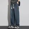 Venta al por mayor transfronteriza de jeans para hombre, con forro polar y tejido grueso, de pierna recta moderna, corte holgado, de pierna ancha, pantalones largos casuales para otoño e invierno