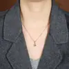 Colgante de Collar Luochen Transfronterizo Más Vendido con Zirconia Hoja de Arce, Cadena de Clavícula Exquisita de Diseño de Nicho de Lujo Ligero para Mujer