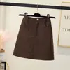 Saia midi de veludo cotelê preta plus size gorda mm outono e inverno que modela o quadril roupa feminina saia evasê emagrecedora versátil saia de um passo saia curta
