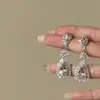 Nuevos pendientes de moda con forma de lágrima totalmente de diamantes, estilo minimalista, pendientes elegantes para mujer, lujo ligero, versátiles, sensación de alta gama
