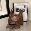 Bolsa Tote de Gran Capacidad Transfronteriza para Mujer 2026 Primavera Nuevo Estilo Coreano Retro Casual Bolso de Hombro Mochila Simple de Moda