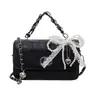 Bolso Pequeño Cuadrado Estilo Coreano Ins para Mujer 2026 Nuevo Modelo Bolso de Hombro con Hebilla de Cierre Estilo Coreano Bolso Cruzado Bolso de Mano Color Sólido para Viajes Cotidianos