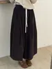 Otoño 2026 Nuevo Estilo Coreano Elegante Diseño de Pierna Ancha Pantalones de Ocho Puntos Color Sólido Con Cordones Pantalones Falda de Pana para Mujer