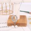 Cadena de suéter larga cruzada espejo para mujer, collar largo de tulipán, accesorios colgantes para ropa de temperamento, fabricantes venden