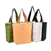 Bolsa de papel Dupont con logo personalizado, bolsa de lona vintage, bolsa de hombro de papel kraft lavable para compras, en stock