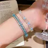 Pulsera de tres capas hueca con cuentas de vidrio de viento de segunda mano, sentido de diseño, personalidad, pulsera simple, lujo ligero, sensación de alta gama, joyería de mano para mujeres