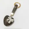 Llavero de corazón de diamantes completos colgante para llave de coche etiqueta de moda se puede abrir llavero de amor