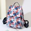 Nueva Mochila Escolar para Mujer Transfronteriza de Tela Oxford Mochila de Gran Capacidad Bolsa de Viaje Casual Mochila de Commuter con Estampado de Moda