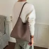 Bolsa Saco Feminina para o Dia a Dia 2026 Nova Coleção de Outono de Alta Qualidade Nicho Textura Trançada Bolsa de Ombro Bolsa Tote de Grande Capacidade