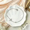 Pulsera de Trébol de Cuatro Hojas de la Suerte con Circonita en Stock Acero de Titanio No se Desvanece Exquisito Accesorio de Nicho para Mujer Pulsera