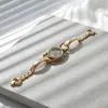 Novo relógio pulseira de botão vintage com toque de alta qualidade para mulheres, pulseira de aço fino transfronteiriça, relógio pulseira de nicho com mostrador aurora para senhoras