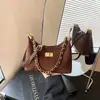 Bolso de otoño vintage para mujer, nuevo y moderno 2026, de alta gama, nicho, lujo ligero, de gamuza, para hombro y cruzado