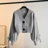 Cárdigan de punto holgado de comercio exterior transfronterizo, nuevo diseño otoño e invierno 2026, abrigo suéter elegante y estiloso para mujer, efecto adelgazante