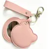 Espejo de maquillaje de cuero PU de moda, espejo giratorio con forma de oso, espejo de bolsillo de cuero, regalo de llavero de viaje portátil, espejo personal