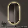 Espejo de baño inteligente ovalado en stock con lijado exterior e iluminación LED translúcida, adecuado para montaje en pared de baño y proyectos hoteleros, con opciones de personalización.