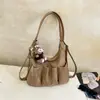 Bolso tote plisado estilo coreano con múltiples bolsillos, una mochila de gran capacidad, elegante y versátil para mujer, adecuado para otoño, para ir al trabajo y como bolso de hombro