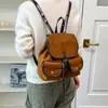 Novo estilo de mochila, adequado para o trajeto diário, bolsa de mão feminina, design retrô, 2026, versátil, pode ser carregada na transversal, no ombro ou como mochila, estilo coreano e japonês, simples, coleção de outono