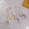 Pendientes de Borlas en Forma de Corazón de Verano 2026 Nuevos de Moda Nicho de Gama Alta Pendientes de Tachuela de Circonita para Mujer, Colgantes para Orejas, Clips para Orejas