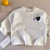 Camiseta para Niños 2026 Principios de Primavera Estilo Japonés para Niños Marca de Moda Corazón Camiseta Básica de Manga Larga Top para Bebé y Niño Pequeño Temporada de Otoño