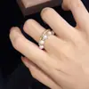 Anillo Doble Círculo de Perlas Xiaomi Zhuji Chapado en Oro de 14K Perla Láser Elástico Abierto Exquisito Moderno y Aclarante de la Piel