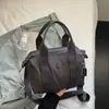 Bolsa de tela casual simple estilo coreano de nicho Bolsa pequeña Bolso cruzado versátil para mujer para el trabajo Bolso de mano Invierno Nuevo estilo