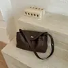 Bolso de hombro liso nuevo 2026, simple y elegante, con un diseño único y moderno, alto atractivo estético, adecuado para ir al trabajo, y un bolso de mano de moda para quienes prefieren un estilo más discreto