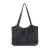 Bolso de Lona Denim Retro para Mujer 2026 Nuevo Moda Bolso de Hombro Único Lavado Gran Capacidad Versátil para Viajes y Uso Diario