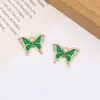 Pingente Borboleta Cravejado com Diamantes e Gotejamento de Óleo Liga Metálica Pulseira Brincos com Preservação de Cor Pingente de Borla Personalizado Acessórios de Joia Venda por Atacado