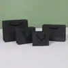Bolsas de Regalo de Papel Negro para Venta al por Mayor Transfronteriza, Bolsas para Empaquetar Joyería, Bolsas Tipo Tote Negras Listas para Usar, Productos Exquisitos Suministrados Directamente por los Fabricantes