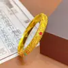 Tienda de oro con esmalte de seda de oro arena pulsera de reina pulsera cerrada de moneda regalo del palacio chino nuevo para novia