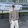 Suéter masculino de outono e inverno com padrão trançado, fecho de meio botão e design falso de duas peças, com gola lapela, em um estilo retro americano clássico