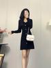 Vestido de Punto Negro Sencillo y Elegante 2026 Estilo Francés de Gama Alta Adelgazante Versátil Vestido de Cuello en V de un Solo Botón Línea A para Mujer