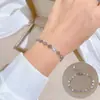 [Acero de titanio para todo el cuerpo] Estilo minimalista de personalidad Dongdaemun pulsera de cadena de cara sonriente personalidad femenina Red social retro Amigas