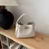 Diseño Nicho Estilo Coreano Bolso Cubo de Mano para Mujer 2026 Transfronterizo Nueva Moda Bolso Madre e Hijo Bolso de Hombro Cruzado Individual de PU