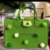 Nueva bolsa de fieltro portátil DIY hecha a mano Bolsa de regalo de dibujos animados para Baby Full Moon, bolso de mano de fieltro para regalo a mano