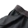 Novos estilos de outono e inverno para mulheres de meia-idade e idosas: calças forradas com fleece e cós elástico, calças cigarette estilo mom, padrão espinha de peixe, calças casuais cropped