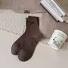 Calcetines Color Café con Moño para Mujer Calcetines Puro Algodón Media Pantorrilla 2026 Nuevo Estilo Popular Estilo Japonés Calcetines de Lunares con Volantes Primavera y Otoño