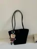 Bolsa de bowling coreana de nicho em formato de coração para mulheres, nova bolsa tote transversal simples e versátil 2026, bolsa de mão para o dia a dia