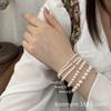 Pulsera elástica Chen Mo de estilo suave, sencilla, retro, con cuentas doradas y perlas, ideal para todo tipo de ocasiones, con diseño exclusivo para mujer.